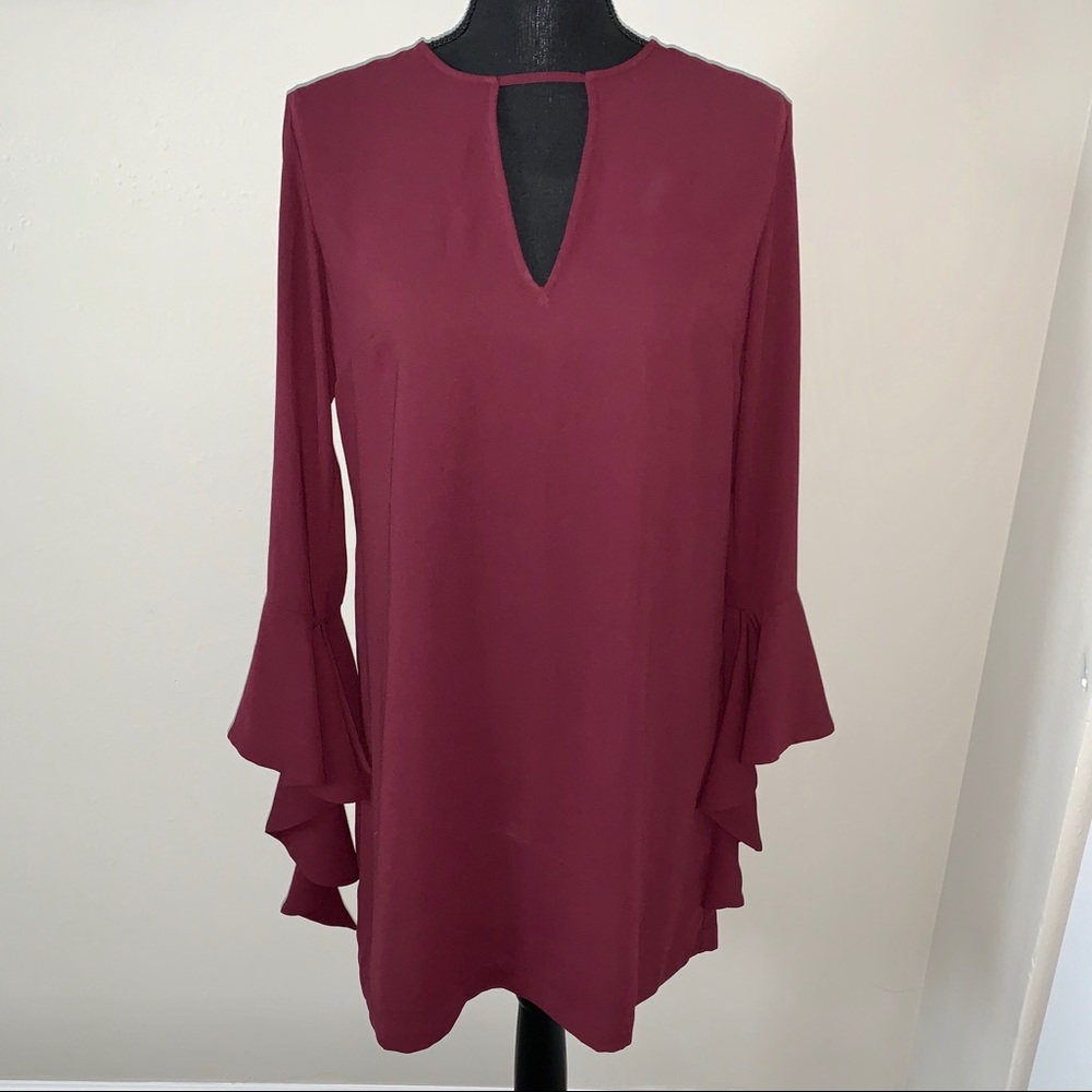 Leith ruby red dress with long sleeves flowing at the ends